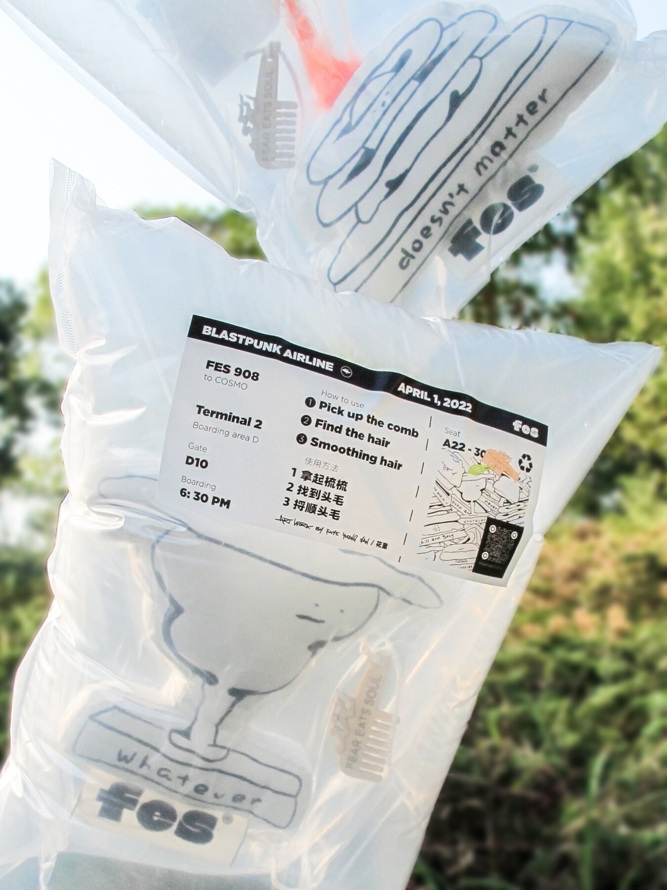 Transparent plush packaging with a boarding-pass-style label
